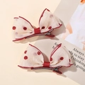 Pair of cream lace bow hair clips with red polka dots on a minimalist aesthetic background - Hair Clip / Red Polka Dot (Pack of 2)