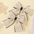 Set of two beige fabric bow hair clips with black trim edge for girls Lolita style - Number 3