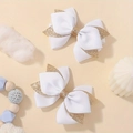 Two-pack handmade white grosgrain and gold glitter bow hair clips for girls - White