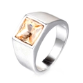 Polished stainless steel ring featuring a large emerald cut champagne stone on white background - Orange Rhinestones