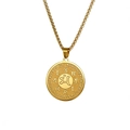 Macro detail of golden stainless steel Buddhist pendant with embossed sacred scriptures - Gold
