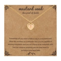 Golden heart necklace with real mustard seed charm on brown kraft display card - Heart-Gold