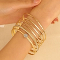 7-piece set of gold vintage alloy bracelets with rhinestones on a woman's wrist - 08 KC Gold DZ-561 (6-Piece Set)