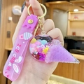 Cute purple ice cream keychain with liquid glitter ball and pink silicone wrist strap - Ice Cream Milk Bean Style / Purple