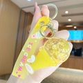 Yellow ice cream liquid quicksand keychain with silicone wristlet and golden hardware - Ice Cream Bubble Style / Yellow