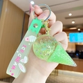 Green ice cream floating keychain with glitter sphere and light green silicone handle strap - Ice Cream Bubble Style / Green