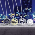 Three Virgo zodiac necklaces in black, gold, and silver finishes with wheat chains - Virgo