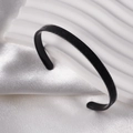 Minimalist matte black stainless steel C-shaped cuff bracelet with a frosted texture finish - Rune Style (Black)