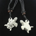 Resin turtle couple pendant necklace with wooden beads and adjustable black woven cord - White