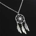 Detailed macro view of dreamcatcher pendant with three delicate silver feather charms - Star Dreamcatcher Style (A)