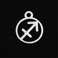 Macro shot of silver stainless steel Sagittarius zodiac charm with hollow cut design - Sagittarius