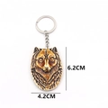 Llavero de cabeza de lobo en resina tallada con efecto hueso y anillo metálico, 6,2 cm - Marrón Rojo