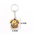 Yin Yang Tai Chi sea turtle keychain with resin tortoise pendant and silver metal ring - Red Brown