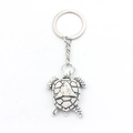 Porte-clés tortue créatif avec pendentif en résine blanche et anneau en métal argenté - Blanc