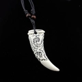 Ethnic vintage tribal necklace with wolf tooth faux bone pendant and black braided cord - Imitation Wolf Tooth Totem Style