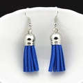 Close-up of bohemian royal blue suede tassel earrings with polished silver metal caps - Royal Blue (M)