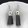 Detailed close-up of bohemian style silver hook earrings with dark grey velvet tassels - Grey (G)