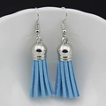 Detail of light blue faux suede tassel earrings with polished silver metal hook and cap - Light Blue (E)