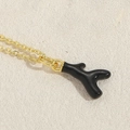 Golden chain necklace featuring a modern black enamel branch shaped pendant for women - Black Branch Style