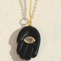 Elegant Hamsa hand necklace with black stone pendant and golden chain for women - Palm Shape / Black Hamsa Hand