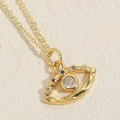 Exquisite gold evil eye heart pendant necklace featuring colorful crystals and central diamond - Hollow Inlaid Eye Style