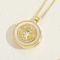 Gold Saint Benedict medal pendant necklace with white mother of pearl inlay detail - Round St Benedict