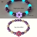 Luminous beaded bracelet with purple flower pendant showing day and night glow effect contrast - Rose Red