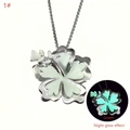 Detailed view of silver hibiscus pendant showing contrast in day and night glow effects - 1# Green Glow