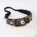 Detailed macro view of baroque headband with crystals and vintage gold metal flowers - Black and White (E)