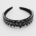 Detailed view of Baroque wide headband with black gems and silver claw set crystals - Black