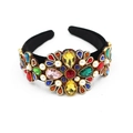 Close-up of luxury Baroque headband with colorful rhinestones on black velvet - Style A