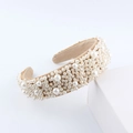 Elegant wide headband for women featuring densely inlaid pearls on a soft velvet lining - White Pearl Style (A)