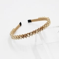 Detalle de diadema barroca con cristales champagne de corte marquesa sobre metal oro - Amarillo