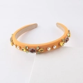 Cerchietto chic in spugna arancione con strass colorati e motivi floreali di gemme - Giallo