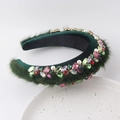 Detail of emerald velvet headband with colorful rhinestones and white pearls on white plate - Dark Green Velvet Green Fur Edge Style / Dark Green