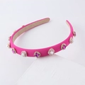 Detail of pink fabric headband with purple crystals and pearl floral ornaments - Rose Red