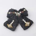 Detailed shot of black tweed bow accessory with white pearls and colorful rhinestones - Black Bow Hair Clip (J)