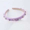 Detail of lavender sponge headband with crystal rhinestones and purple camellia flowers - Purple