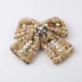 Detailed view of yellow tweed bow accessory with inlaid pearls and colorful crystals - Yellow Bow Hair Clip (K)