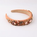 Detail of pink padded headband with rhinestones, pearls and golden butterfly accents - Ginger Yellow