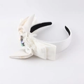 Elegante cerchietto in velluto bianco con un grande fiocco e fiori di cristallo scintillanti - Bianco