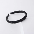 Detailed view of hand-woven black crystal beads on a minimalist fabric headband - Black