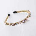 Detail of woven gold headband with pink gems, enamel flowers, and sparkling rhinestones - Pink