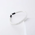 Detail of beaded headband featuring shimmering crystal beads and white fabric wrap - White