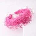 Detailed view of the rose pink headband featuring dense long tassels and feather texture - Rose Red (F)