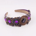 Detailed close-up of Baroque purple crystal headband with hand-sewn beadwork and soft velvet lining - Purple