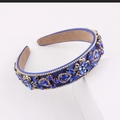 Detail showing deep blue baroque headband with sparkling crystals and golden metal flowers - Sapphire Blue