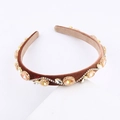 Vintage brown velvet headband with wavy gold settings and sparkling colored crystals - Brown