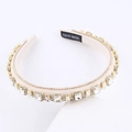 Detail view of rhinestone headband with white fabric and black handmade logo label - Off White