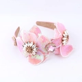 Close-up of pink sequin floral headband with crystals and gold base details - Pink